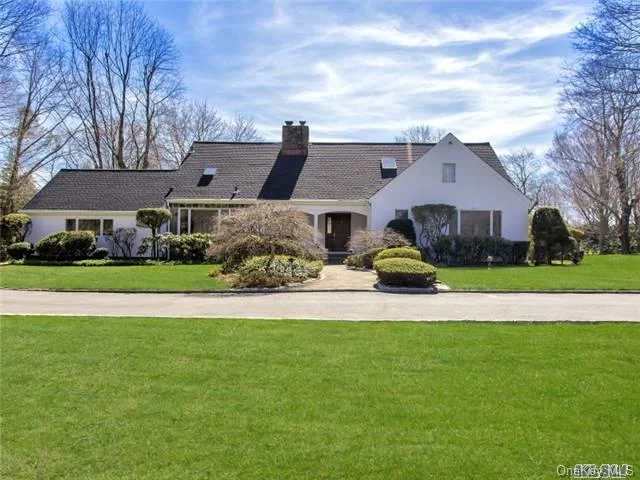 Not On Route 107 ! Beautiful Farm Colonial W/ Covered Front Porch, 5 Bedrooms, Master On The Main, Beautiful Hardwood Floors Throughout, Outstanding Great Room. Perched High On A Hill With Park-Like Setting. Featuring Inground Pool, Tennis, & Specimen Plantings. Tree Lined Drive On A Private Cul-De-Sac Close To Lie & Lirr, Middle School And High School, Close To All!