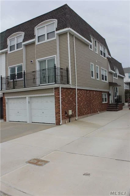 Brand New Triplex Apt W/Garage In Bay Terrace Area Of Bayside Near Shopping Center & Recreation.  Features 3 Levels Of Living Space Over 1800&rsquo; With Hardwood Flooring, 3 Br, 2.5 Baths, Office, Family Room W/Wood Burning Fireplace, Private Fenced In Back Yard, Laundry, 1 Car Garage, & 1 Additional Spot. Lirr To Penn & Express Bus To Midtown 2 Blocks Away.