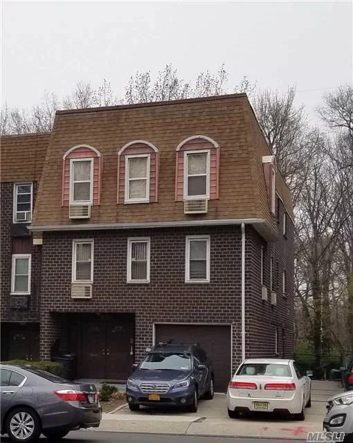 Legal 2 Family Home In The Heart Of Bay Terrace/Fort Totten. All Units Offer Spacious Layouts. Large Living Rooms And Dining Rooms , Eat In Kitchens, Mbr Suites W/Baths. Large Backyard. Private Driveway Can Fit 3 Cars. Attached Garage.