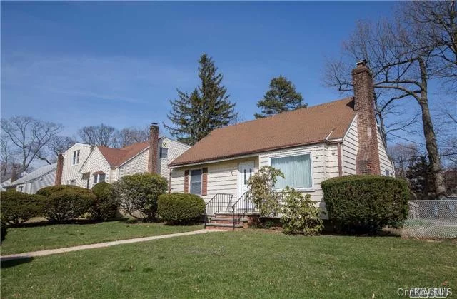 Bright And Airy Corner Cape With Freshly Renovated First Level With Two Bedrooms. Hardwood Floors Throughout, Working Fireplace, Stainless Steel Appliances. Two Spacious Bedrooms On Second Level. Located On Large Corner Lot, Wide Front Lawn And Large Backyard. Finished Basement Can Be Configured To Suit A Variety Of Needs.