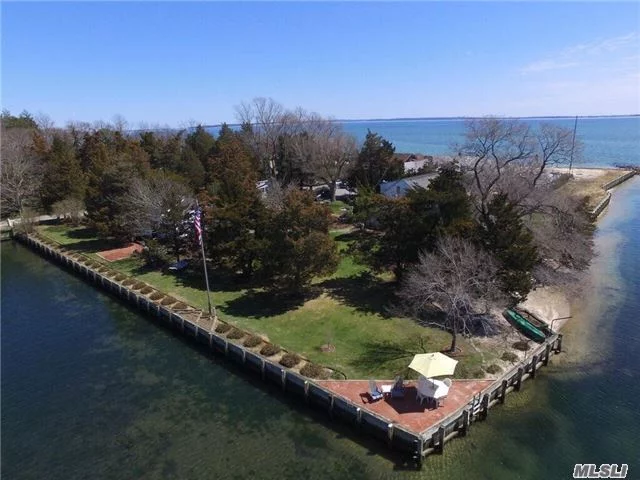 Idyllic Waterfront Property On 3/4+ Acres,  Private Community White Sand Beach. Charming Main House Has 4 Bdrm, 2 1/2 Baths, Den. Adorable Legal Guest Cottage W/2 Bdrm, 1 Bath. Both Houses Have Waterfront Decks And Waterviews (Main House On 3 Sides) Deeded View Of Peconic Bay. 270&rsquo; Private Bulkhead, 462&rsquo; White Sand Hoa Beach. Landscaped. Perfect For Boat Owner Must See!