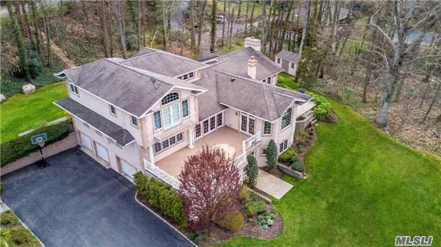 Meticulously Maintained Sprawling Colonial Set On 2 Quiet & Serene Acres. Gourmet Eat In Kitchen W/ Center Island & French Doors Lead To Breakfast Balcony Overlooking Cold Spring Harbor. Beautiful Views From Every Room. Gleaming Hardwood Floors Throughout. High Ceilings. Private Master Suite W/2 Walk In Closets And Spacious Master Bath. Central Vac. Surround Sound!