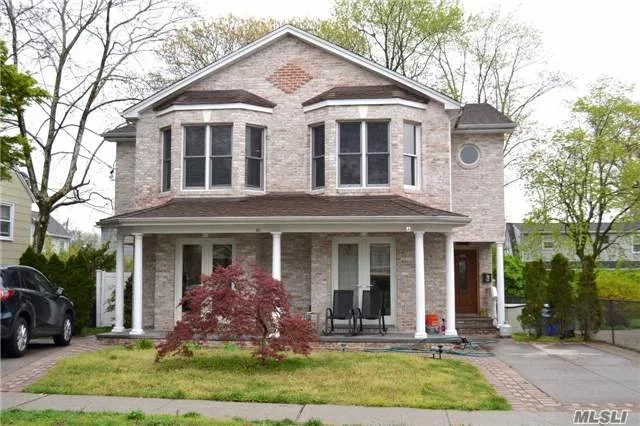 Prestine Conditon. Recently Built 2 Family Brick Colonial. State Of The Art Kitchen, Pvt Backyrd, Double Driveway, Full Finished Bsmt With High Ceilings, Eik With Ss Appliances & Granite Countertops,  Lr/Dr & Den. Master Bath With His/Her Closets, Oak Floors