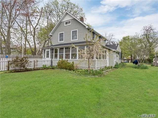 Lovely Colonial Circa 1890 On Big Beautiful Lot (See Survey) New 30 Year Architectural Roof, New Vinyl Siding, Wide Plank Hw Floors Under All Laminate Flooring (See Pic) Central Ac, Gas Heat, Detached 2 Car Garage With Electric, Chicken Coop, Low Taxes,  Charm Charm Charm!!!- This Is The One You Have Been Waiting For!-