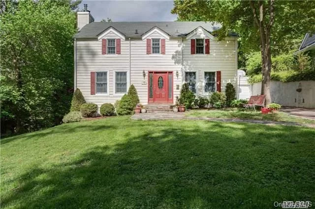 Wonderful 3 Bedroom, 2 Bath Center Hall Colonial Nestled In Beautiful Baxter Estates. Generous Living Room W Wb Fireplace, Open Eat-In-Kitchen/ Dining Room, Family Room. Master Suite With 2 Addl Bedrooms & Full Bath. Finished Basement With Wet Bar. Gorgeous Deep Property & Close To All That Port Washington Has To Offer. Incredible Opportunity In An Amazing Location!