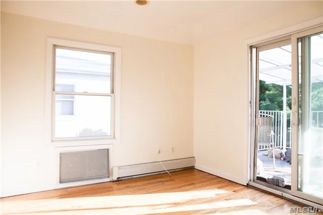 Bright Two Bedroom Apartment In An Excellent Location, 5 Minute Walk To Lirr, One Block From Northern Blvd. Hardwood Floors And Spacious Private Terrace. Easy Street Parking. School District 26. Won&rsquo;t Last!