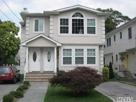 This Is Very Nice 2 Family House Stucco Second Floor L/D 3 Bedrooms 1/5 Bath With W/D Eat In Kitchen.