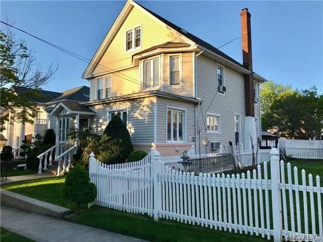 The Only 2 Family House In This Exclusive Area. Owners Are Contractors And Renovated The Entire House. 9 Foot Ceilings On 1st Floor, Large Rooms And Hardwood Floors Throughout. Upstairs Apt Is A Large Duplex Unit. House Has Two Staircase Systems Connecting All Floors. In Addition To Private Entrances To All Units, Beautiful Oversize Yard Near Buses, Trains/Lirr & Shopping