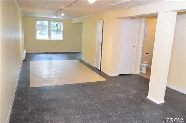 Great Cellar Studio With Bed Alcove, Sliding Door To Exclusive Use Fenced Backyard, Updated Kitchenette And Bath, New Stove, Storage, Laundry On Premises, Walk To Bay Terrace Shopping Ctr, Movies, Pool, Tennis, Golf, Park, Q28 And Qm20, Small Dog Or Cat Okay.