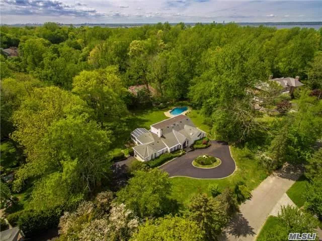 Bright And Airy Expanded Ranch Rebuilt In 1989 On Prestigious Hilldale Lane With Private Beach Association. This Lovely Home Sits On 1.11 Acres With Master Suite On Main, 4 Family Brs, 3.5 Bths, Lr W/Fp, Dr, Fr, Sun Rm, Lg Eik, Heated Pool, 2-Car Garage.