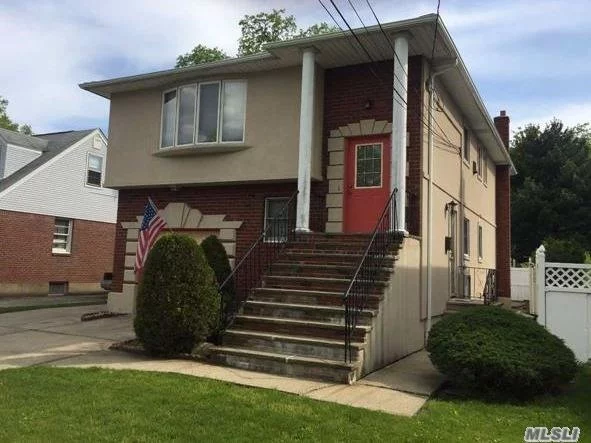 This Very Spacious In-Line High Ranch Is In Move In Condition. It&rsquo;s In A Mid-Block Location With A Beautiful Stucco Siding And Brick Accents On The Facade. A Great House, Lovingly Maintained By The Original Owners.