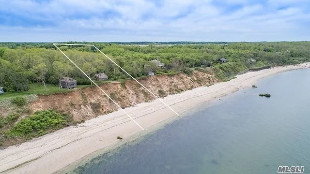 One In A Million On The Sound & Off The Beaten Track. Rising To A 50&rsquo; Bluff Overlooking The Water, The East Side Of This Wooded Lot Is Bounded By The Peconic Land Trust, Ensuring A Forever Natural Setting. There Are Spectacular Water Views On The Sound & A 100 Ft Private Sandy Beach Below, With Outrageous Sunsets Nightly. Get Ready To Build You House Of A Lifetime.