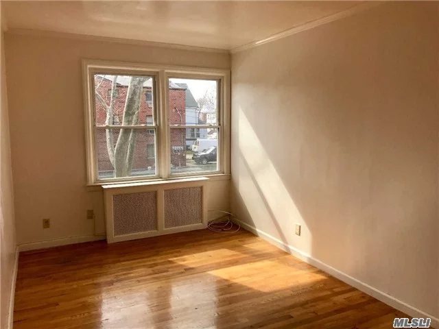 Bright & Cozy 3 Bedroom Apartment!! Hardwood Floors Throughout. Lots Of Closet Space. Easy Commute! Convenient Location Just 1 Block From Union Tpke. Access To Q46 Bus To E/F Train, Q65 Bus To Flushing! Qm2 Express Bus! Easy Street Parking. Great For Small Family! **Heat & Water Included! Great Apartment. Must See! Available To Show!!