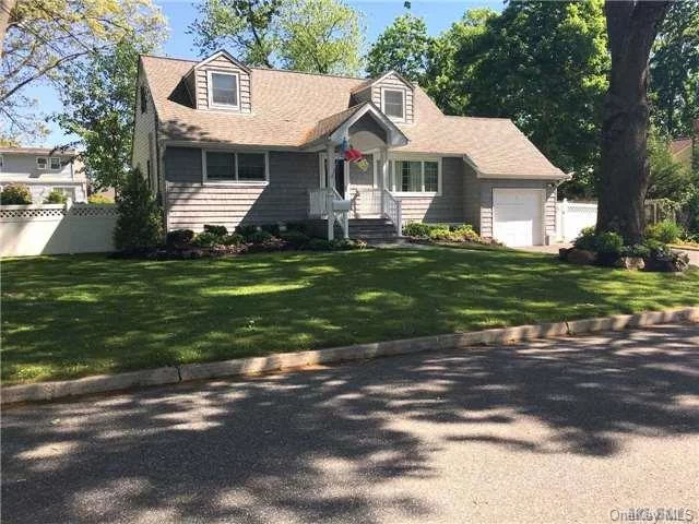 Gorgeous Family Home Nestled On A Lovely Tree Lined Street. Totally Renovated To The Studs With In Last 5 Years! New Baths/Kitchen/Heating/Cac//Custom Built In Through Out/Flat .25 Acre/Professionally Landscaped Too Much Too List.. Be The First To See The Fabulous Family Home! Will Not Last!!!