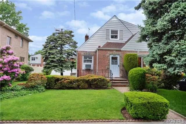 Beautiful Spacious Cape For Sale On Over-Sized Lot - 60X100 In Fresh Meadows Featuring 4 Bedrooms, Eik, Formal Dr Spacious Bedrooms And Full Finished Basement. Newer Roof, Private Yard And Private Driveway