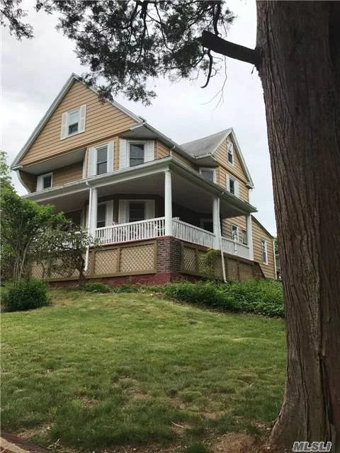 Pre -Existing Non Conforming 2 Family Victorian With Wrap Around Porch.  Corner Property, Detached 2 Car Garage.  Units Have Separate New Heat And Hot Water.