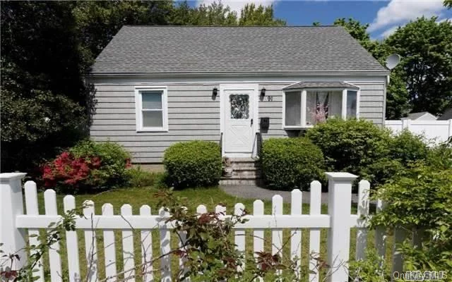 4 Bedroom Cape With Hardwood Floors, Full Basement And Large Backyard. Close Proximity To Lirr (Only .5 Miles Away).