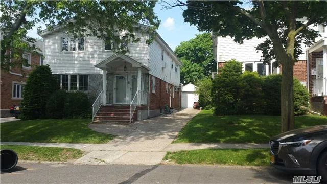 Detached Excellent Condition 2 Family In Quiet Neighborhood. Near Alley Pond Park. 2nd Floor Unit Added In 2004. Large Finished Basement With Jacuzzi. 9 New Split Unit Ac. Sump Pump. First Floor 1 Bedroom Has Heated Floor.