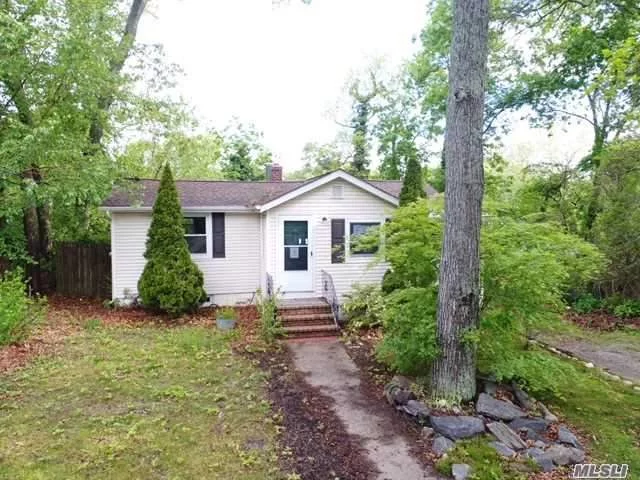 Quaint Ranch In The Heart Of Sound Beach. This 2 Bedroom Home Showcases A Lovely Interior. An Updated Kitchen With Stainless Steel Appliances. Updated Cabinets And Counters W/ Wood Floor. Updated Bathroom Featuring Beautiful Tile Work Through Out. Open Living Area With A Gorgeous Wood Burning Stove. Spiral Staircase To Full Finished Basement. Large Yard With Full Deck.