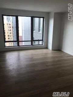 Brand New Condo, Gym, 24Hrs Security Doorman, Top Quality Appliances, Washer/Dryer/Dishwasher In The Unit, Heating Included, Two Blocks To #7 Train & Lirr, Convenient To All.