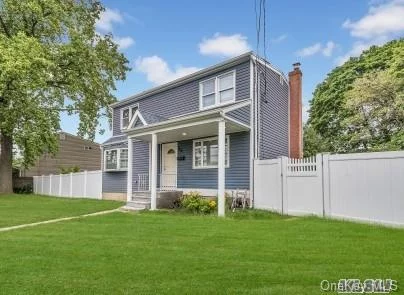 Diamond Expanded Cape!***All New! Siding, Windows, Kitchen, And Baths! Detached Garage! Full Basement With Ose! Fenced Yard.