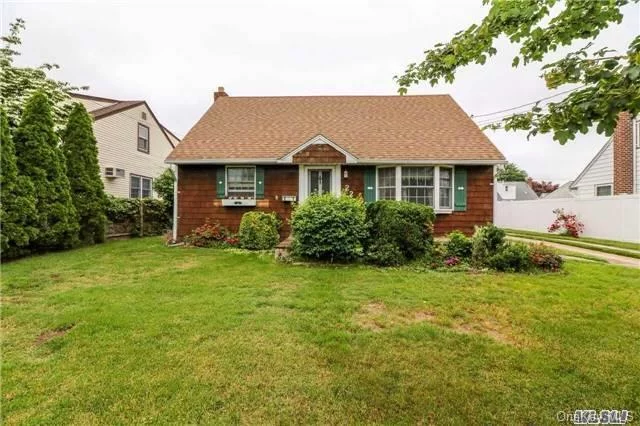 4 Bedroom, 1 Bath, Mid Block Cape , North Side Of The Street, 1 Block North Of Hempstead Tpke And Close To Rt 135. Home Offers Hardwood Floors Throughout, Great Location And Excellent Value For The Price.