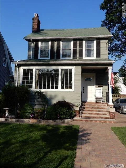 In Prime Location Of Bayside. 3 Bedroom, 1.5 Bath House, Living Room With Fireplace Wood Stove Insert, Formal Dining Room, Renovated Kitchen And Hardwood Floors. Close To Schools, Stores, Lirr And Local Bus. Renovated , Central Air, Very Nice Space !! Quick Stroll To Schools & Bell Blvd, Francis Lewis Blvd,  Very Quiet Block, Sprinklers, With Room For Expansion .