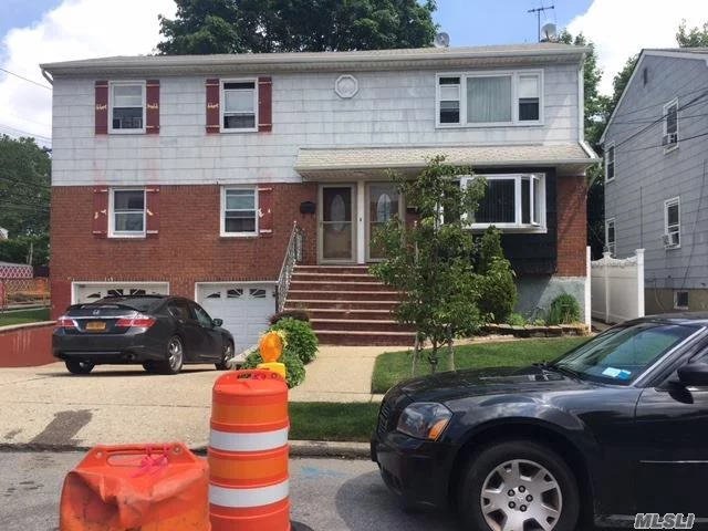 Large 2 Family House. Livingroom And Diningroom With Hardwood Floors, Eat In Kitchen 3 Bedroom And Full Bath Up And Down. Full Finished Basement. Convenient To All!