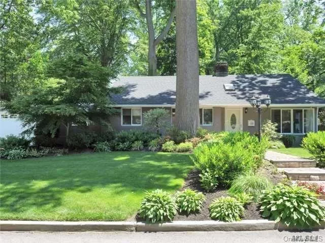 With A Clever Reuse Of Space This Fabulous Mid Century Ranch Will Suit All Lifestyles. Nestled On A Beautiful Private Fenced Property Surrounded By A Canopy Of Trees This Home Features 3 Bedrooms, 2 Full Baths, Living/Din, Fireplace, Kitchen With Sliders Exiting To A Brick Patio With A Lush Backyard.