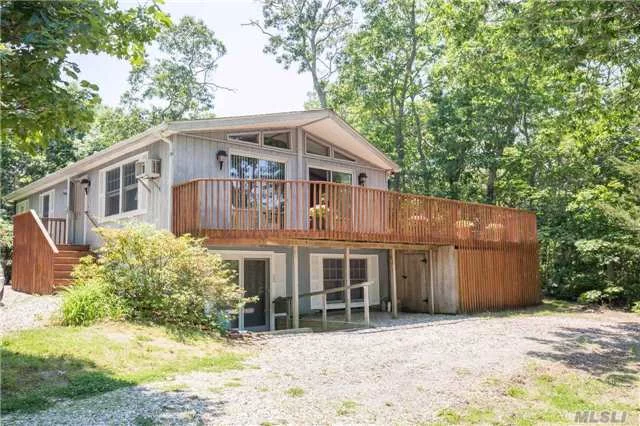 Southold - Laughing Waters - Water View Cottage. Experience Barefoot Summer Days. Community Beach And Marina. Two Bedroom, Two Bath, Great Room With Vaulted Ceiling. Indoor-Outdoor Living. Fabulous Potential For Charming, Prime Location North Fork Property.