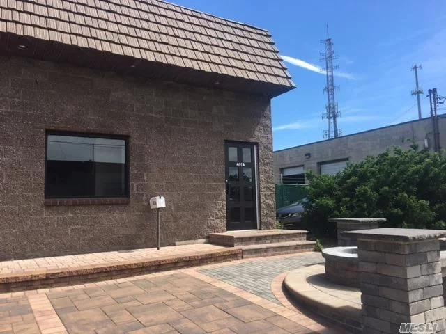 Wow! Commercial Office & Warehouse. Approx 1250 Sq Ft (25X50) Industrial Unit W/High Ceilings. Small Office Area W/ Lavatory & Private Office W/Cac (25X10) Approx.250 Sq Ft. - Warehouse Appr 1000 Sq Ft W/Open Space & Lavatory, Overhead Door & Loft (25X10) Approx. 250 Sq Ft. No Automotive. Tenant Pays 1 Month Rent, Security & Fee - Unit #401A - $1550 Plus Utilities & Garb.