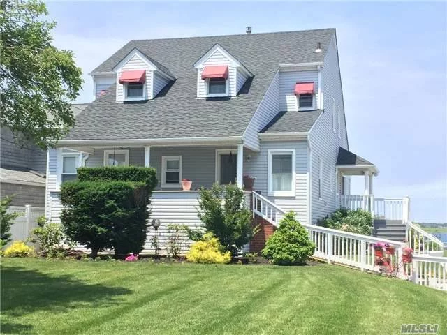 One Of The Largest Bay Front Properties. 2 Family. Over 1/4 Acre With Private Beach And Docking Rights. Enjoy Beautiful Sunsets, Fishing, Boating And Nyc Skyline From Your Back Yard. Private Beach Rights With Lockers. Driveway For 10+ Cars. Rental Covers Taxes And Utilities.