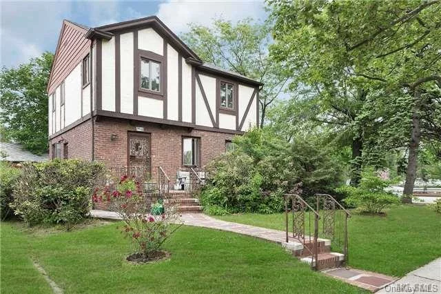 Lovely Detached Tudor Home Features; Spacious Rooms, Freshly Painted, Beautiful Crown Molding Throughout, Hardwood Floors Under Carpeting, Vinyl Windows & 7 Year Old Roof. This Home Needs Updating...Home & Appliances In As Is Condition. Must See!