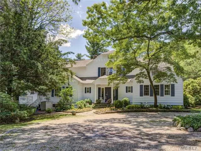 Unique Opportunity To Own Updated Hampton Style 6 Bedroom Colonial On 2.9 Gorgeous Acres W/ Open Fields, Specimen Plantings, & Spectacular Water Views! A Cottage W/ Fp, In Ground Gunite Heated Pool, Red Clay Tennis Court, And 25 Feet Of Beachfront Complete This Story Book Setting. Deeded Mooring Rights. Private Police Force.