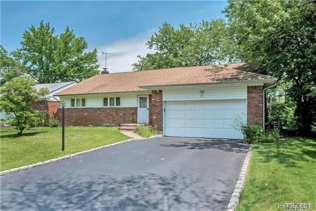 Roslyn. Sprawling Ranch With 3 Bedrooms And 2 Bathrooms Perfectly Situated Mid-Block. Home Offers Formal Dining Room And Generous Living Room, Along With A Spacious Family Room That Opens Up Off Of The Kitchen. Gas Cooking.