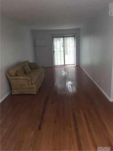 Beautiful Fully Renovated 1 Bedroom Condominium With Sliders To Backyard, Washer/Dryer In Unit, Custom Designed Kitchen And Bath, Gorgeous Hardwood Floors, Close To Transportation And Shops