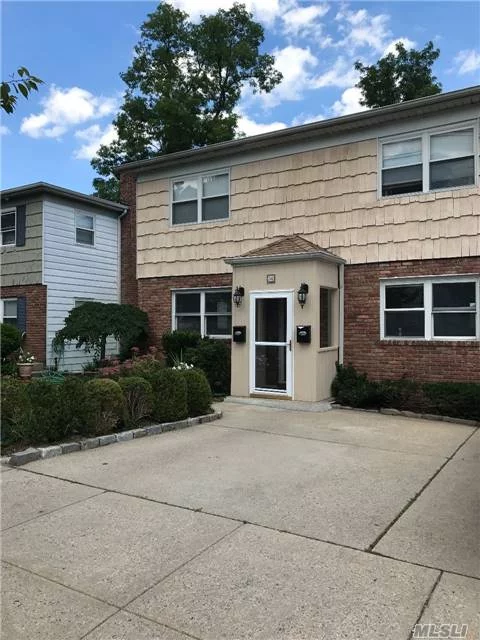 Bright, Sunny 2 Bedroom, 2 Bath, Living Room And Dining Room. Fully Finished Basement With Family Room, Office, Laundry And Sliders To Wood Deck And Garden. Wood Floors Throughout, Off Street Parking Available. Close To Park, Pool, Tennis, Beach, And Restaurants.