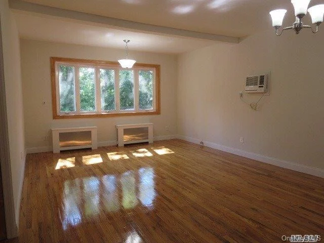 Great 2 Bed, 1 Bath Apartment. Apt Is Featured On The 1st Floor Of A Detached 2 Family Home,  Renovated For Next Tenant, New Windows, Beautiuful Renovated, Shiny Hardwood Floors Throughout, New Baths, New Kitchen, Tenant Only Pays Electricity, Gas (Hot Water, Cooking, Heat) Included, Shared Yard, Laundry On Premises. Near All