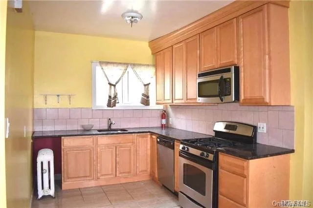 Bright, Spacious And Cozy 3 Brs Apt In Most Desired Bayside Area. Excellent Condition! Large Eat-In-Kitchen. Beautiful Hardwood Parquet Flooring Through Out! Walk To Lirr Bayside Station, Q27, Q12, Q13, Q31. School District #26 (P.S.31, M.S.158, Cardozo H.S). Close To Shops, Restaurants, Bank, Library, School Etc.. Water & Heat Are Included! Won&rsquo;t Last!