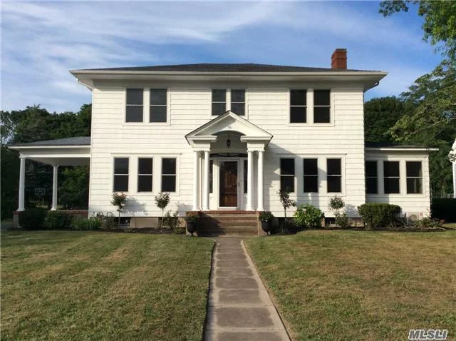 Beautifully Renovated 1920S Colonial Home. This Spacious Home Features A Flr W/Fplc, Fdr, Kitchen, Den, Office, Master Br W/Ensuite, 3 Guest Brs, Guest Bath, Hardwood Fl Throughout, Cac And Full Basement. Fully Fenced Yard With Igp W/New Liner, 2 Car Garage And Property Backs Up To Preserved Land. Property Also Has Deeded Access To Peconic River. Close To All.