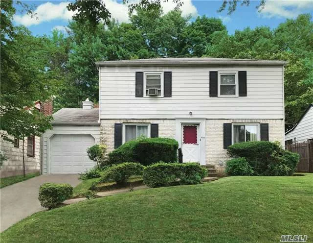 Exceptional Opportunity! Great Residential Mid-Block Location! Classic & Spacious 1800 Sq Ft Colonial With 3 Bedrooms/1.5 Bths!Beautiful Oak Wood Floors!Full Basement! As Is Close To Shopping, Alley Pond Park & All Transportion! P.S.46 & Cardozo H.S.! Create Your Dream Home!