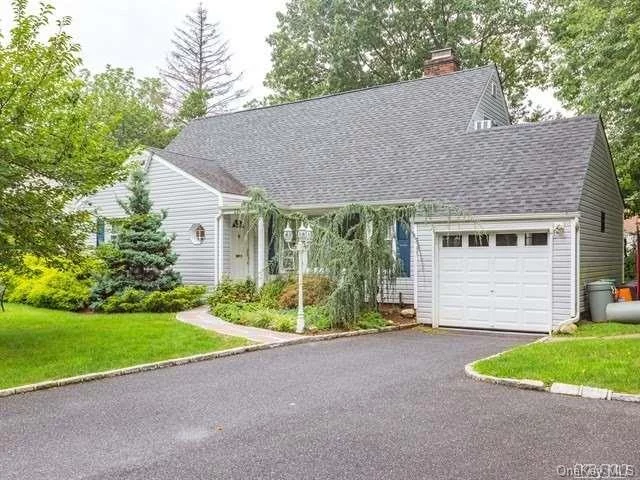 Roslyn Heights. Updated Cape In The Heart Of East Hills. 4 Bedrooms, 2 Full Baths. Living Room W/ Fireplace, Full Newly Finished Basement. Hardwood Floors. Sliding Doors Lead To Deck And Large Backyard. Conveniently Located Near Pkwys And Lirr. Membership To The East Hills Pool/ Park.