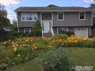 Beautiful Wideline Hi Ranch, Great Curb Appeal W/Newly Vinyl Sided Exterior, Eik W/Breakfast Counter & Skylight, Full Bath W/Skylight, Cac On 2nd Floor Only, All Windows Replaced, Seller Owns Solar Panels, Average Electric Bill $13 Per Month, Over 1/4 Acre, Breathtaking, Expansive, Colorful Flowers & Gardens.