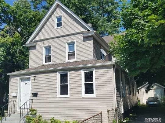 Investor Special - Legal 2-Family; Fully-Updated; Diamond Condition Duplex, New Siding, H/W Floors, Low Taxes. Huge Backyard. Fully Occupied Rent Roll $48, 000.