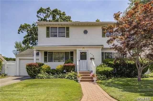 Traditional Expanded 1800 Sq. Ft. Colonial Which Offers A True Formal Dining Rm, Crown Mouldings, & Built-In Bookshelves With Some Modern Flair In The New Kitchen And Baths! Natural Stone Counters, Subway Tile, Ss Apps In Kitchen!Light&Bright Kitchen&Breakfast Rm With Wall Of Windows Overlooks Manicured Yard&Deck!New 200 Amps! Commuter&rsquo;s Delight!Birch Lane School!Low Taxes!