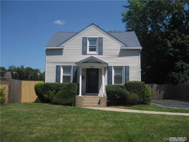 Vintage Colonial In Islip Hamlet. The Feel Of Yesteryear With The Amenities Of Today. Enjoy An Updated Kitchen With Plenty Of Counter Space, Updated Baths With A Touch Of Vintage Flair, Newly Finished Hardwood Floors,  Beautiful Original Woodwork And Staircase. Nicely Landscaped With A Deck And Large Shed In The Back Yard. Close To Town, Restaurants And Train Station.