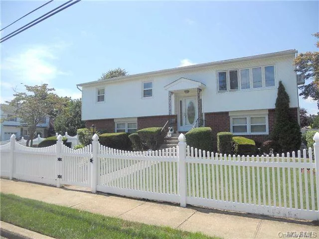 Great Cul-De-Sac In A Beautiful Neighborhood! New Doors Upstairs And New Ceramic Floor In Kitchen. Boiler Approx. 10 Years Old. Nice Size Rooms. Large Den With Full Bath And Sliders To Yard. Fully Fenced Property. Newer Paved Walk. Pull Down Attic. School District 23.