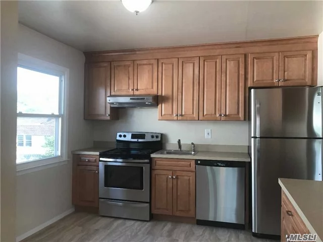 Newly Renovated Duplex Apt W/Garage And Balcony In Bay Terrace Area Of Bayside Near Shopping Center And Recreation. Features 2 Levels And Over 1300&rsquo; Of Space With Hardwood Floors, 3 Br, 2 Full Baths, Laundry Room, Garage And Driveway For Additional Car. Lirr To Penn And Qm2 Express Bus To Midtown 1 Block Away.