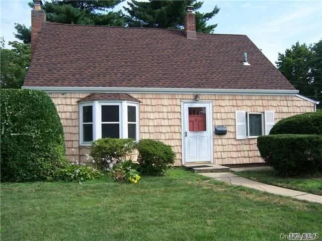 Expanded Mid-Block Cape. Large Living Room And Dining Room With Wood Burning Fireplace. New Bay Window In The Dining Rm. Updated Windows. New Slider To Rear Yard. 2 Full Tiled Bths. New Roof & Gutter On House. Roof On Garage Will Be Repaired. New Carpeting And Freshly Painted. Newer W/D. Macarthur High School.