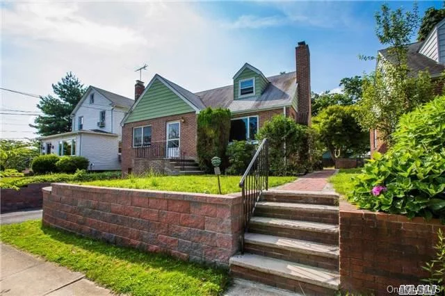 Great Location, Minutes To Lirr & Town, Bright Living Room, 4 Bedrooms With 2 Full Baths, Hardwood Floor, Newly Renovated Kitchen, Over-Sized Garage. A Must See In The Area.